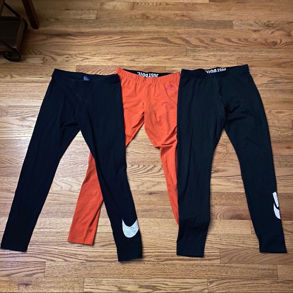 3 pairs of size medium Nike running leggings